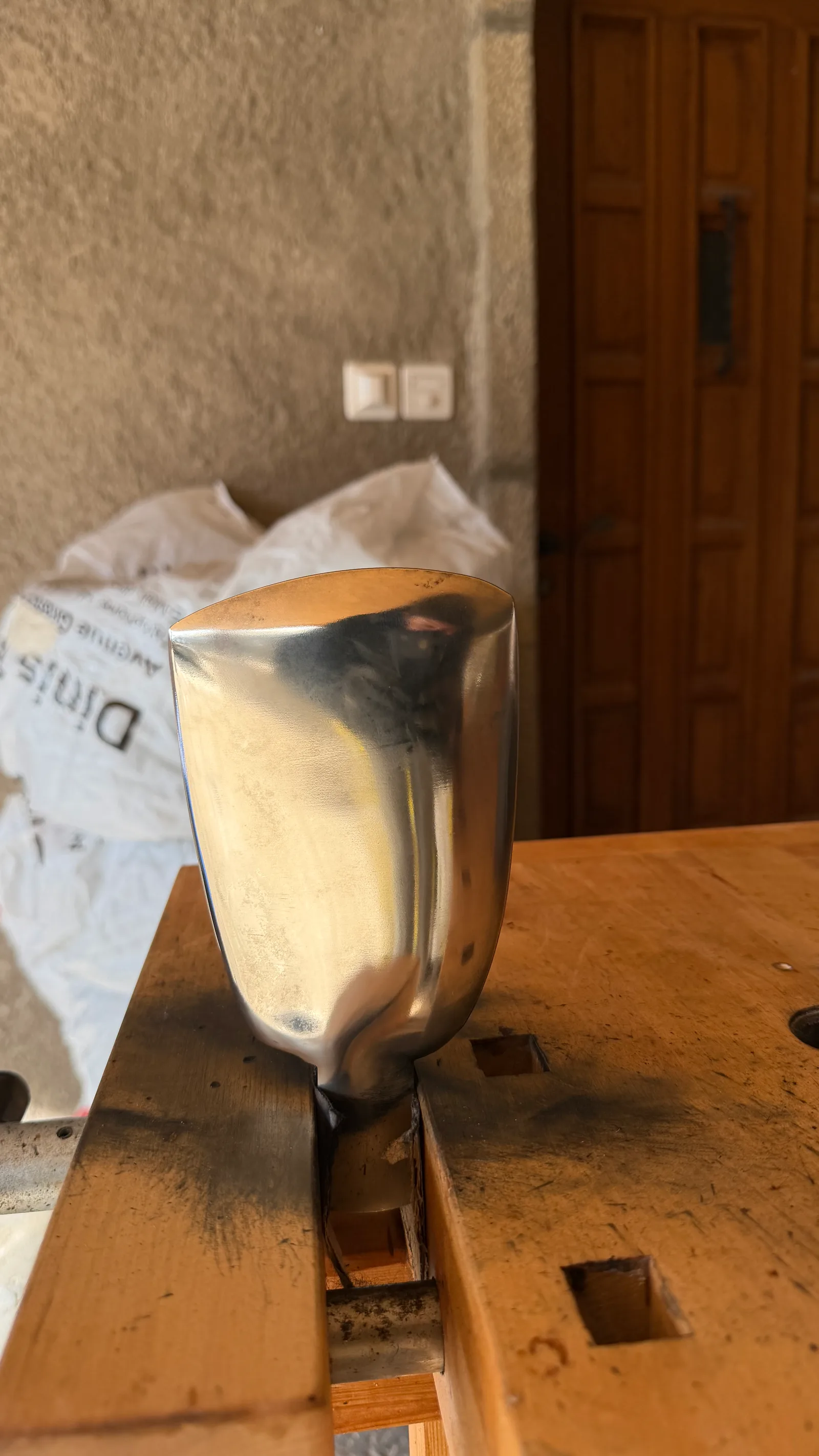 A single Gori propeller blade mirror-polished on the workbench after disassembly